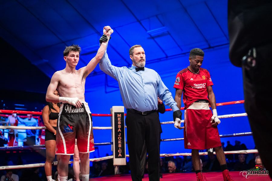 Retias Wheaton has his hand raised after the bout